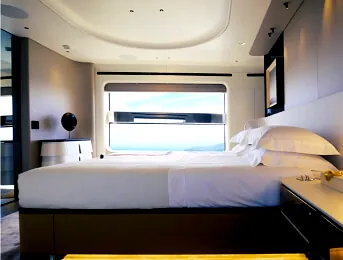 Elegant yacht bedroom with smart lighting and home cinema integration UAE